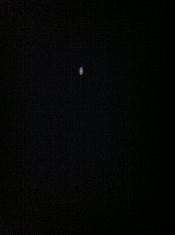 Saturn. It appears on its side because of the angle I was viewing it from. Click through to see the full image.